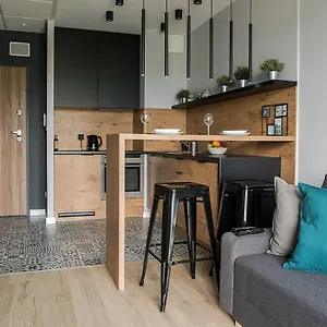 https://wola-loft-apartment.warsawhotelspoland.com